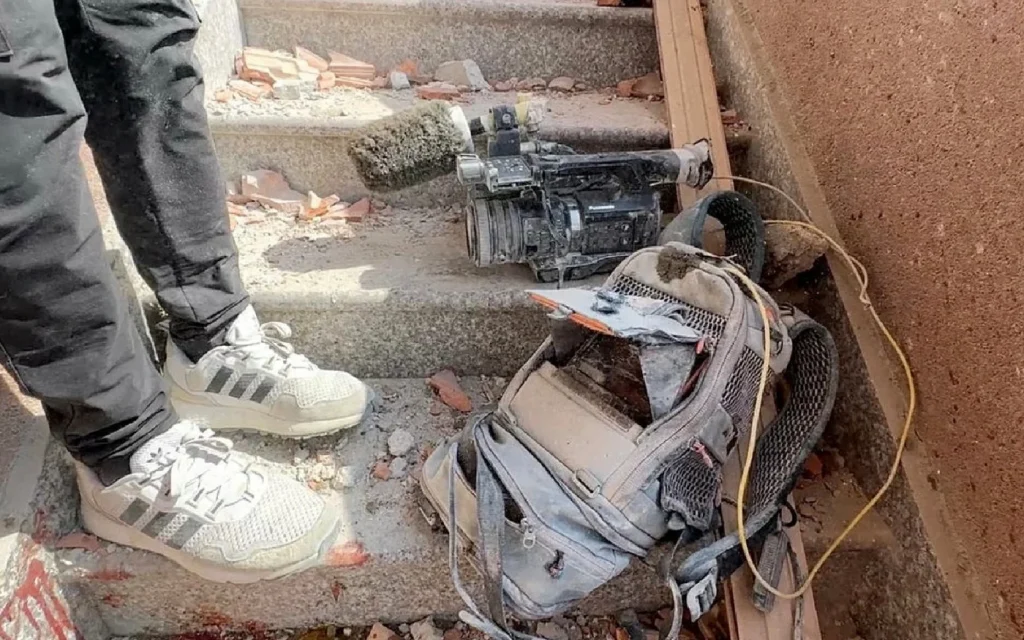 Equipment used by Palestinian cameraman Hussam al-Masri, who was a contractor for Reuters, lies at the site where he was killed reuters 25 aug 2025.jpg